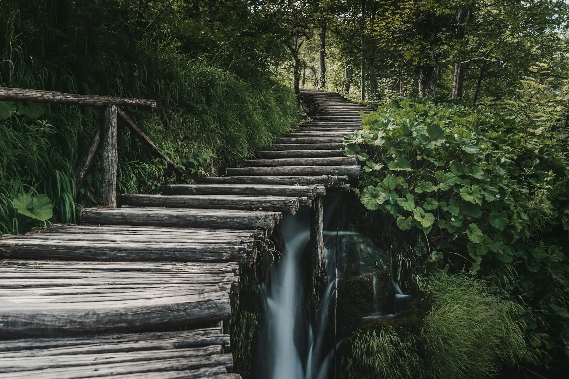 Wooden boardwalk over the water at Plitvice Lakes National Park