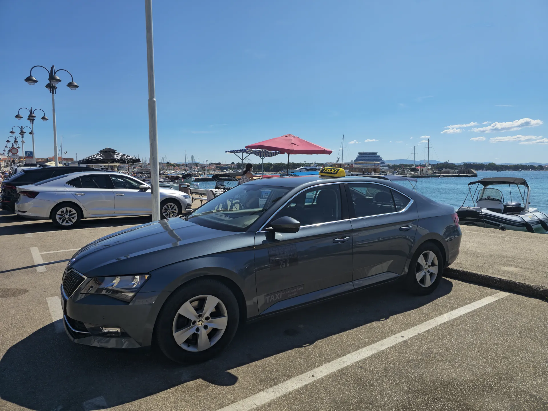TAXI Antonio's Škoda Superb on the Vodice seafront next to the marina